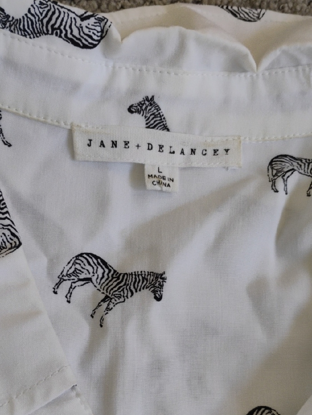 Jane + Delancey White Zebra Print Top